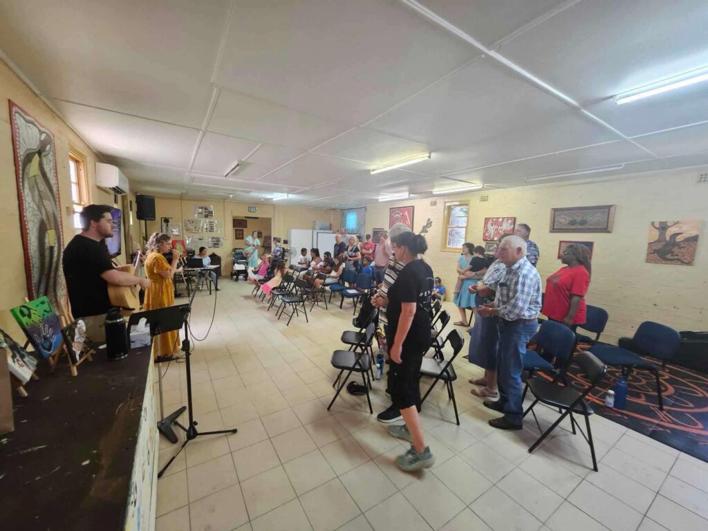 People worshipping in a church service